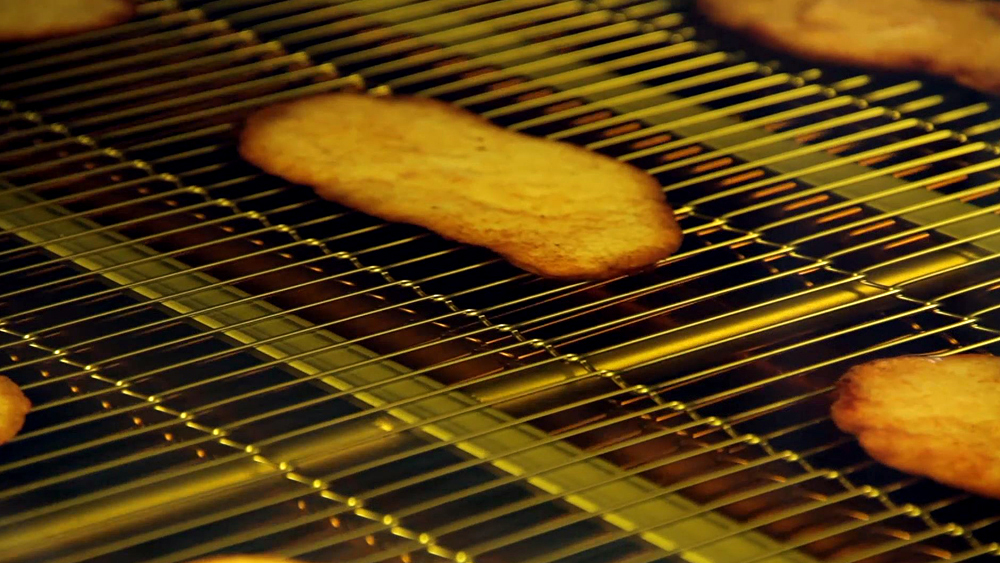 schnitzel in oil in AGF Pro Fryer by alco food machines batter